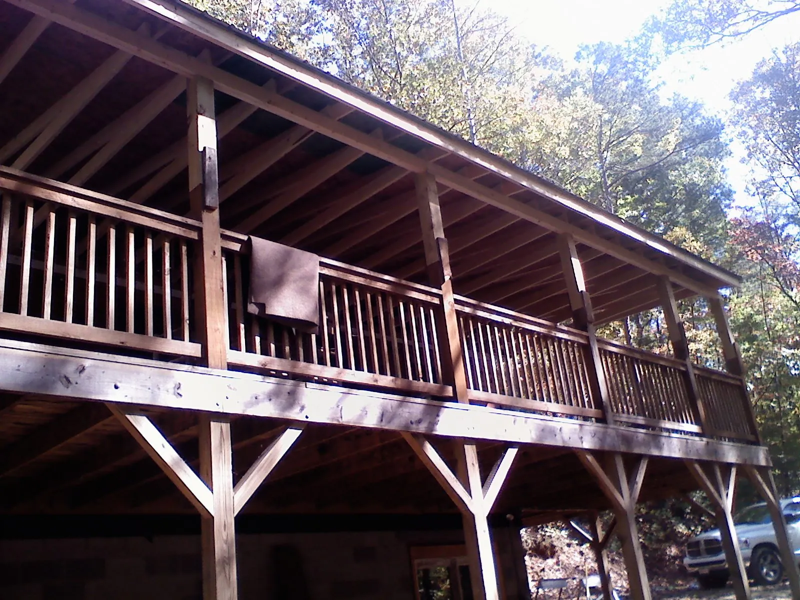 Timber framing under a new elevated porch and deck — Roof Leak Repair in Mattawan by Roofing Brothers